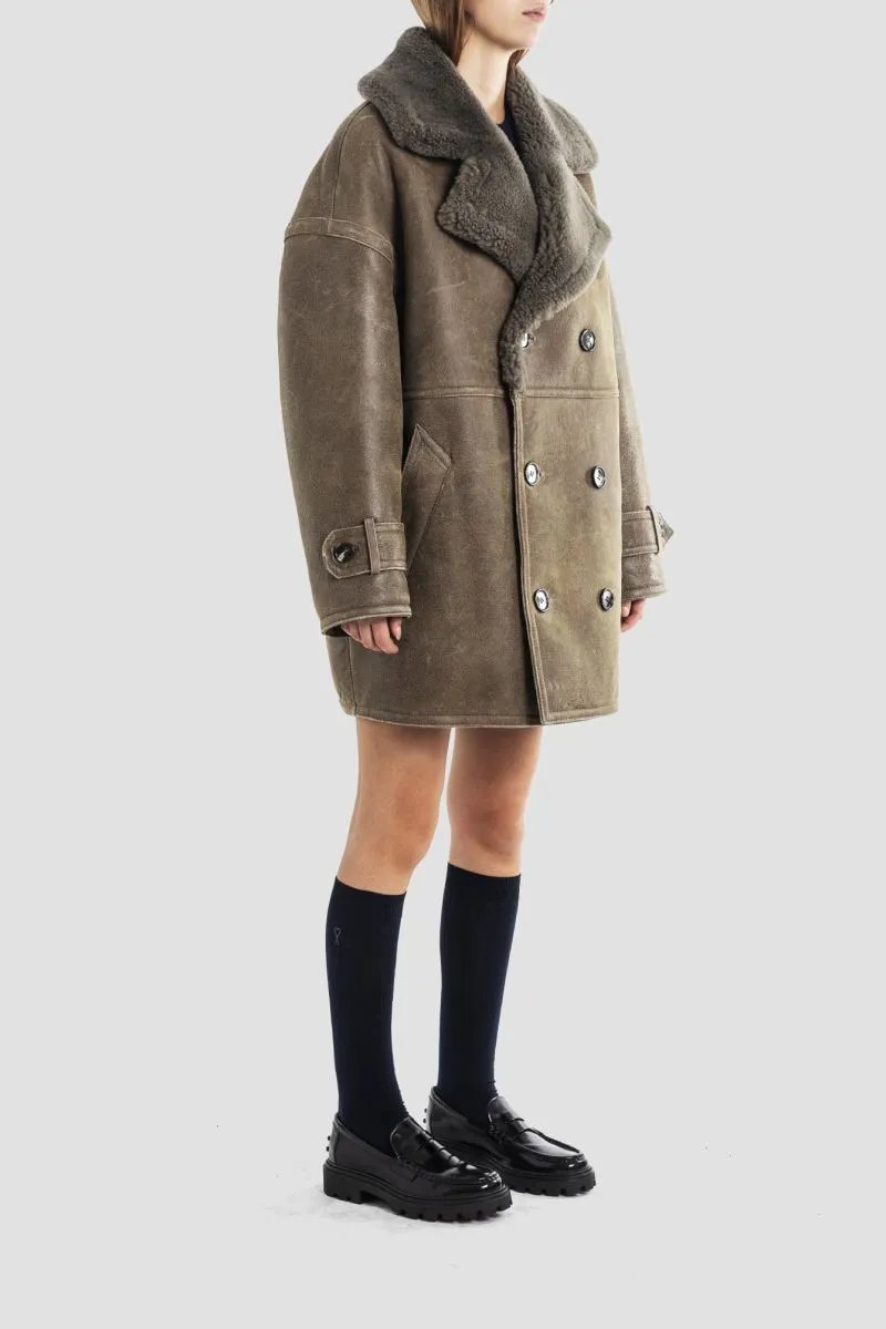 Manteau croisé en peau lainée