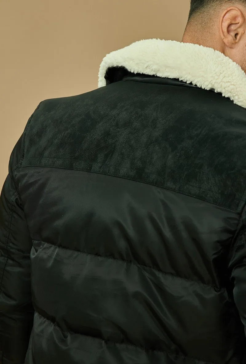 Veste matelassée avec un col à revers moumouté
