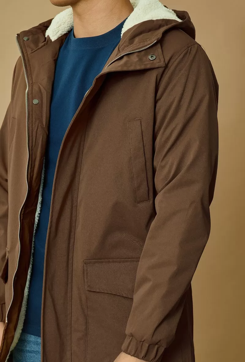 Veste parka milongue à capuche moumoutée